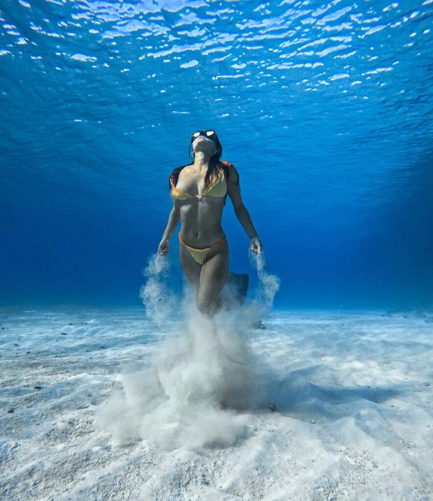 underwater photographer capturing portraits in coral reef Cozumel